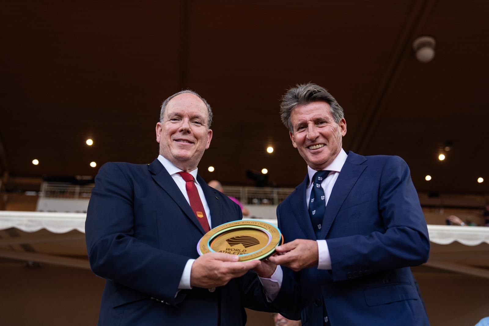 His Serene Highness Prince Albert II of Monaco receives the Heritage Plaque from World Athletics President Sebastian Coe