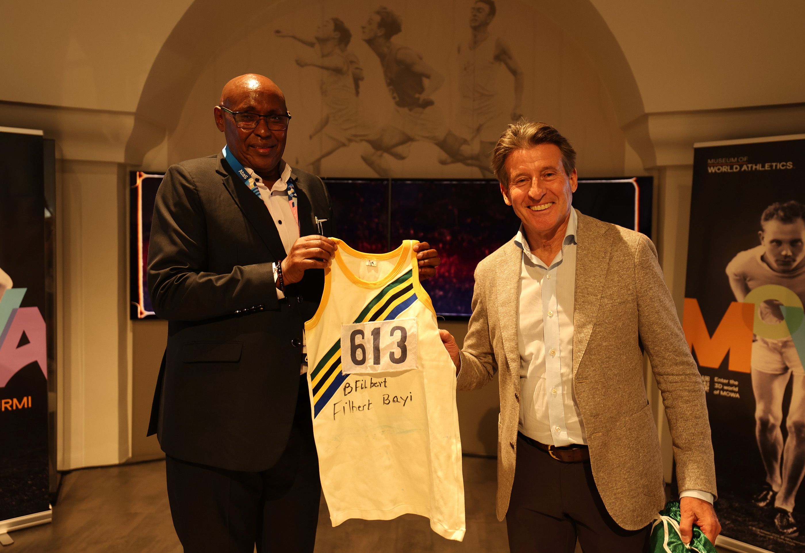 Filbert Bayi presents his singlet to Sebastian Coe in Paris