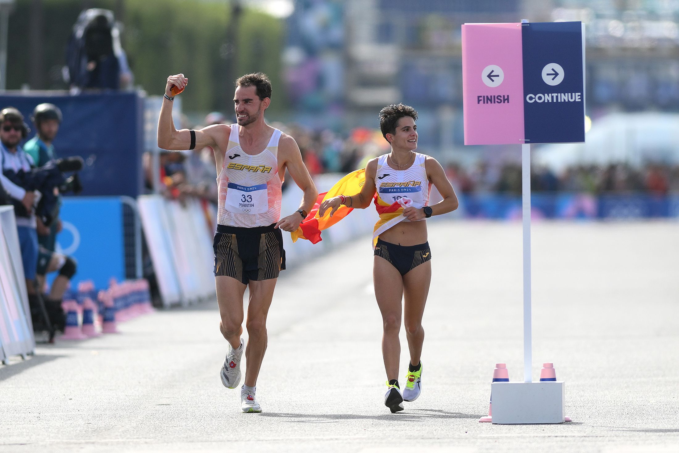 Alvaro Martin and Maria Perez after winning the marathon race walk mixed relay in Paris