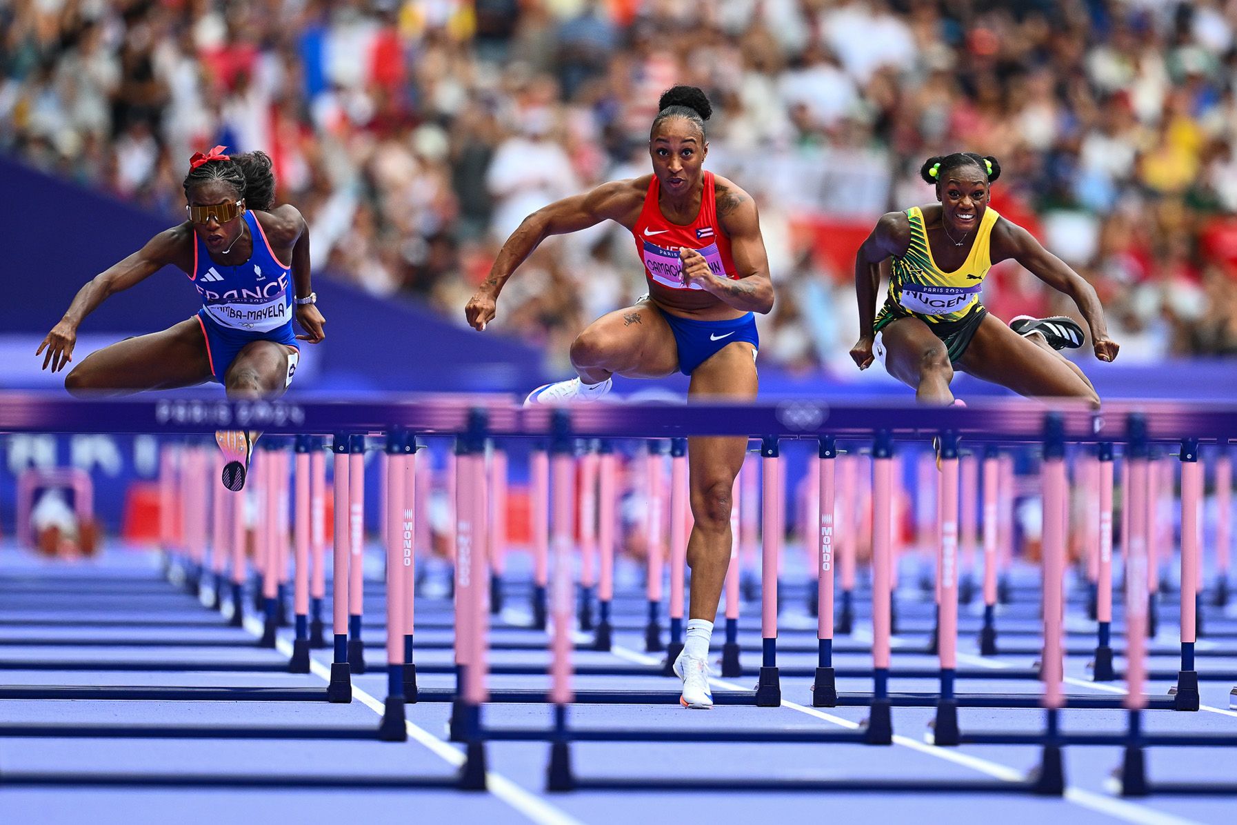 Cyrena Samba-Mayela and Jasmine Camacho-Quinn in 100m hurdles action in Paris