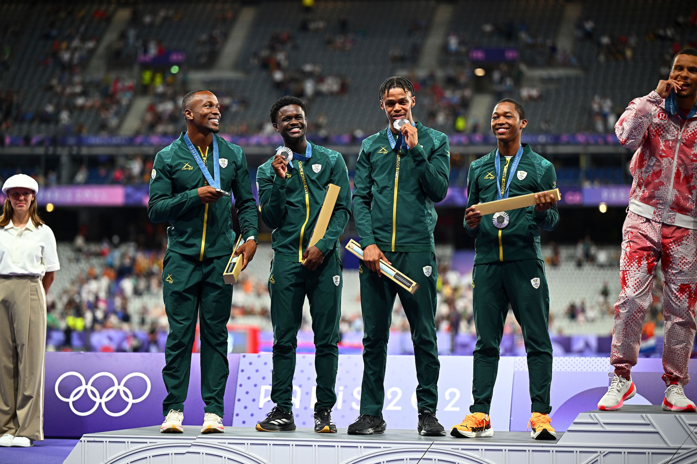 Akani Simbine, Bradley Nkoana, Shaun Maswanganyi and Bayanda Walaza receive their Olympic medals in Paris