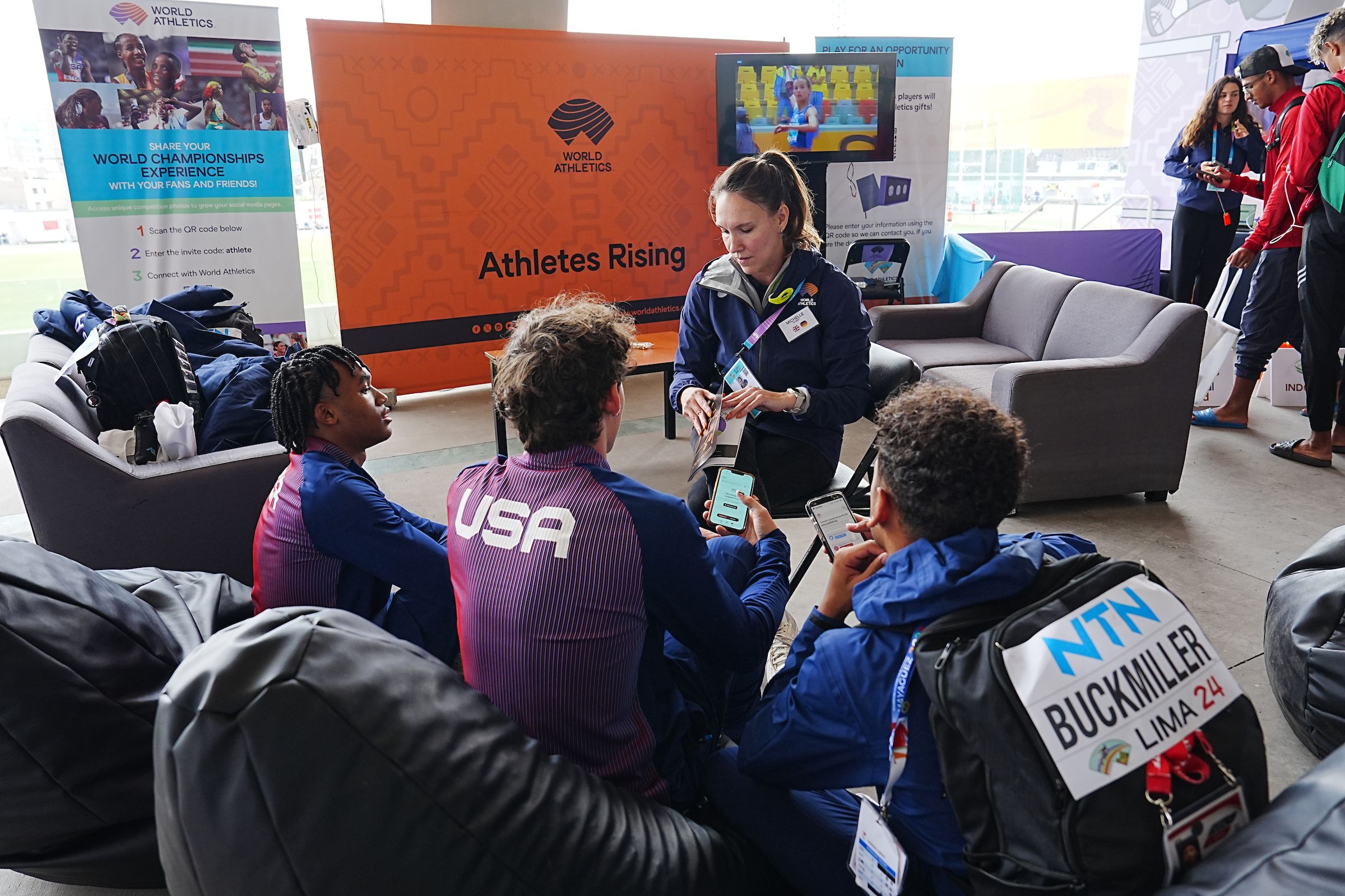 Athletes learn from Michelle Sammet in the Athlete Zone in Lima