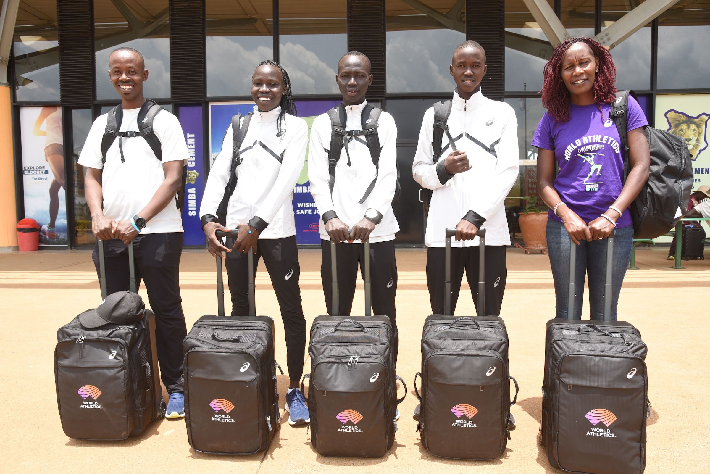 Coaches Arcade Arakaza and Janeth Jepkosgei with athletes Zinad Joseph, Lokoro Dario and James Lomoi Lochauluka