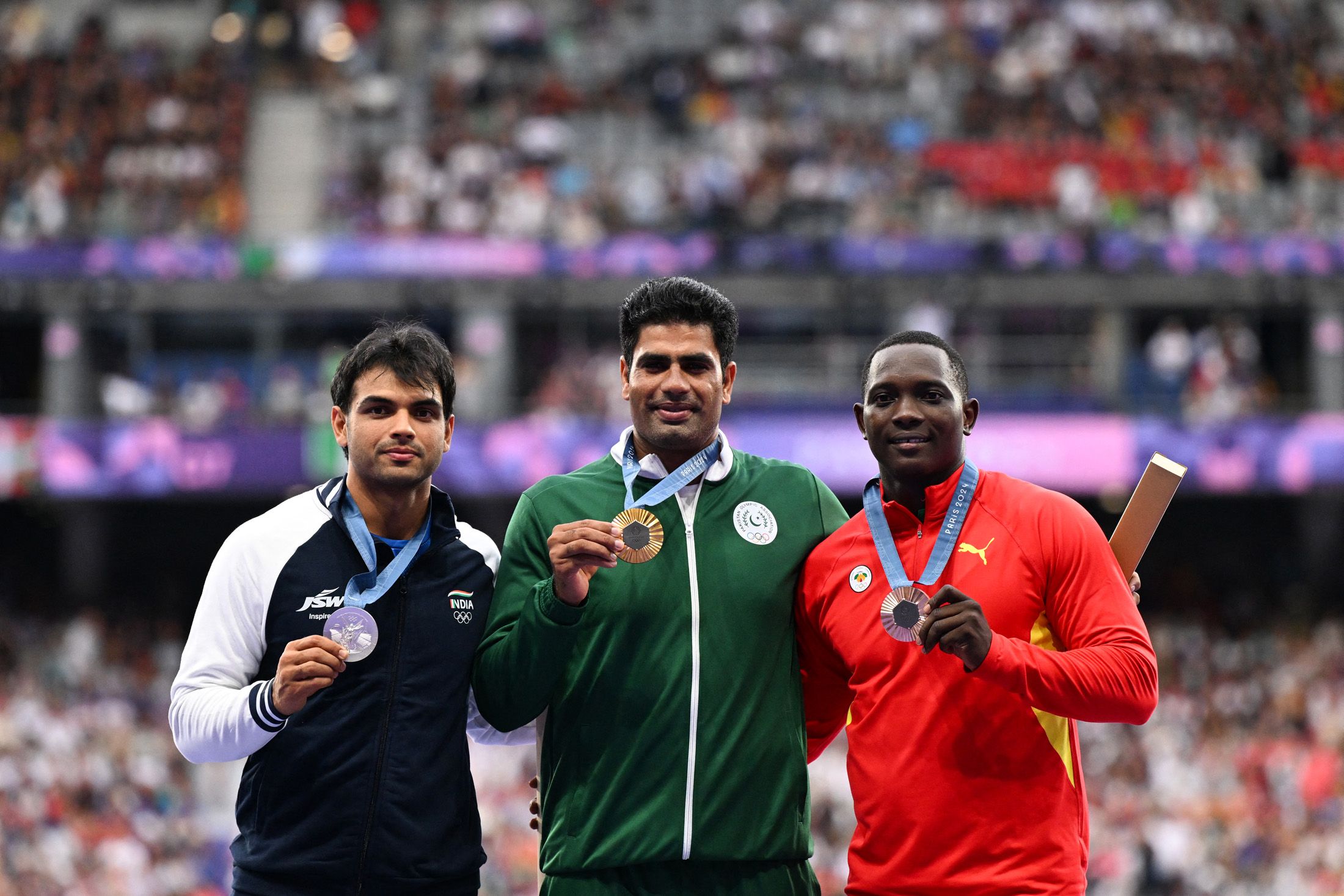 Neeraj Chopra, Arshad Nadeem and Anderson Peters on the javelin podium in Paris