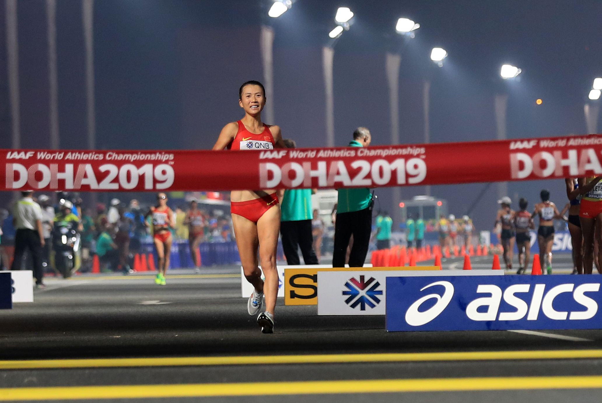 Liu Hong on her way to leading China to a sweep of the women's 20km race walk medals in Doha