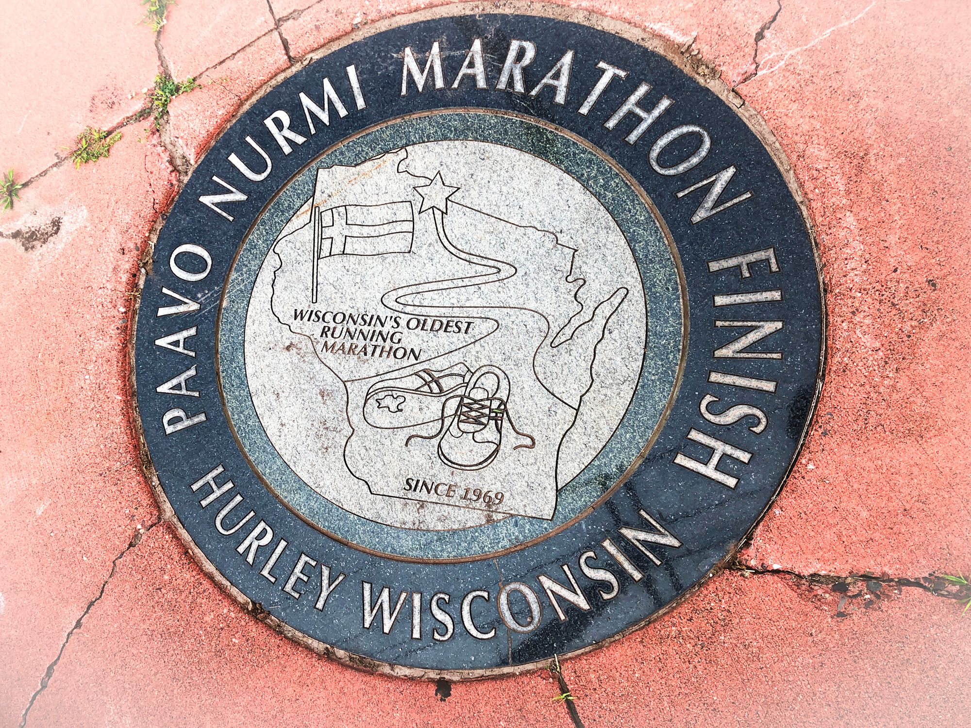 The Paavo Nurmi Marathon street plaque in Hurley, Wisconsin