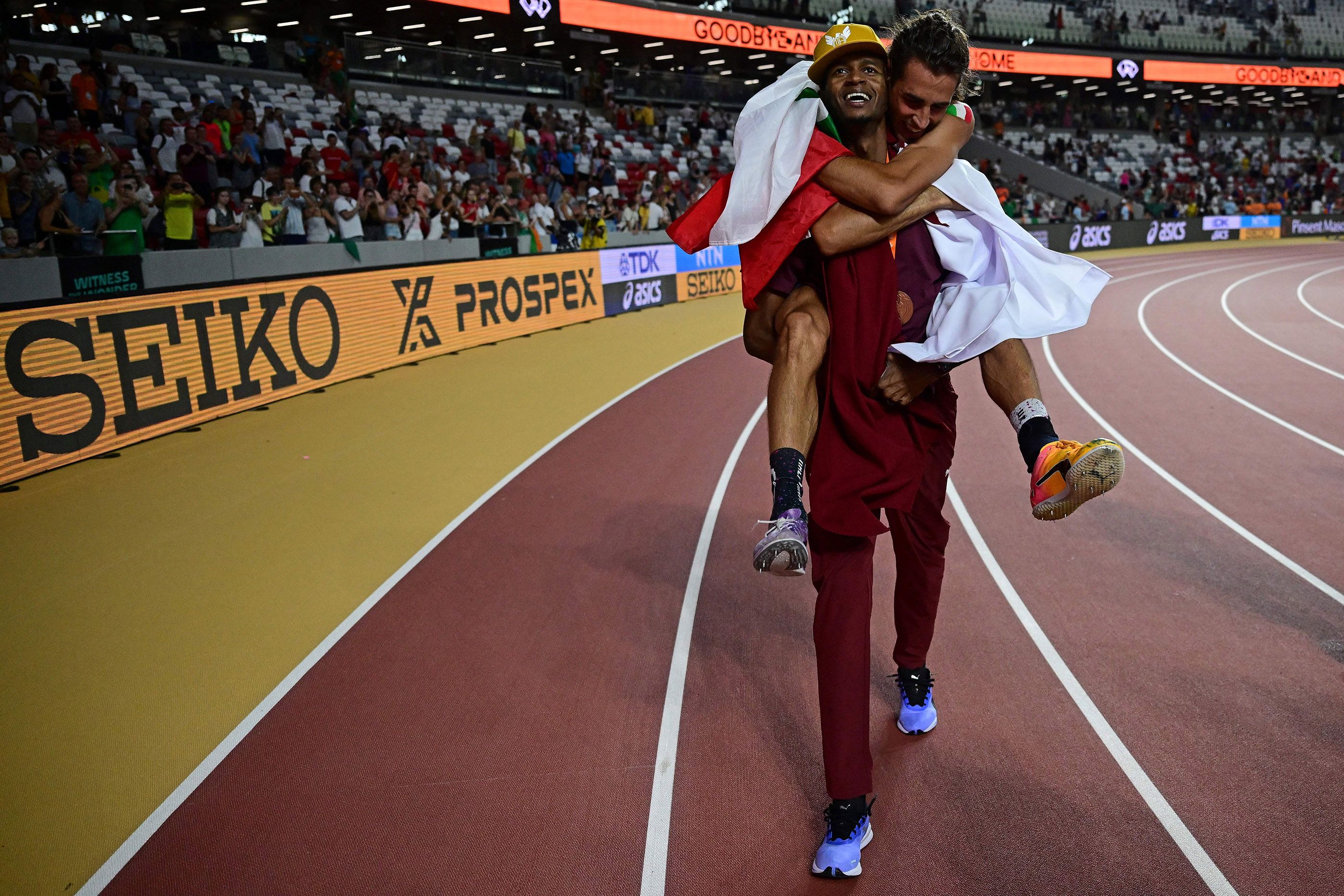 Mutaz Barshim and Gianmarco Tamberi celebrate at the World Championships in Budapest in 2023