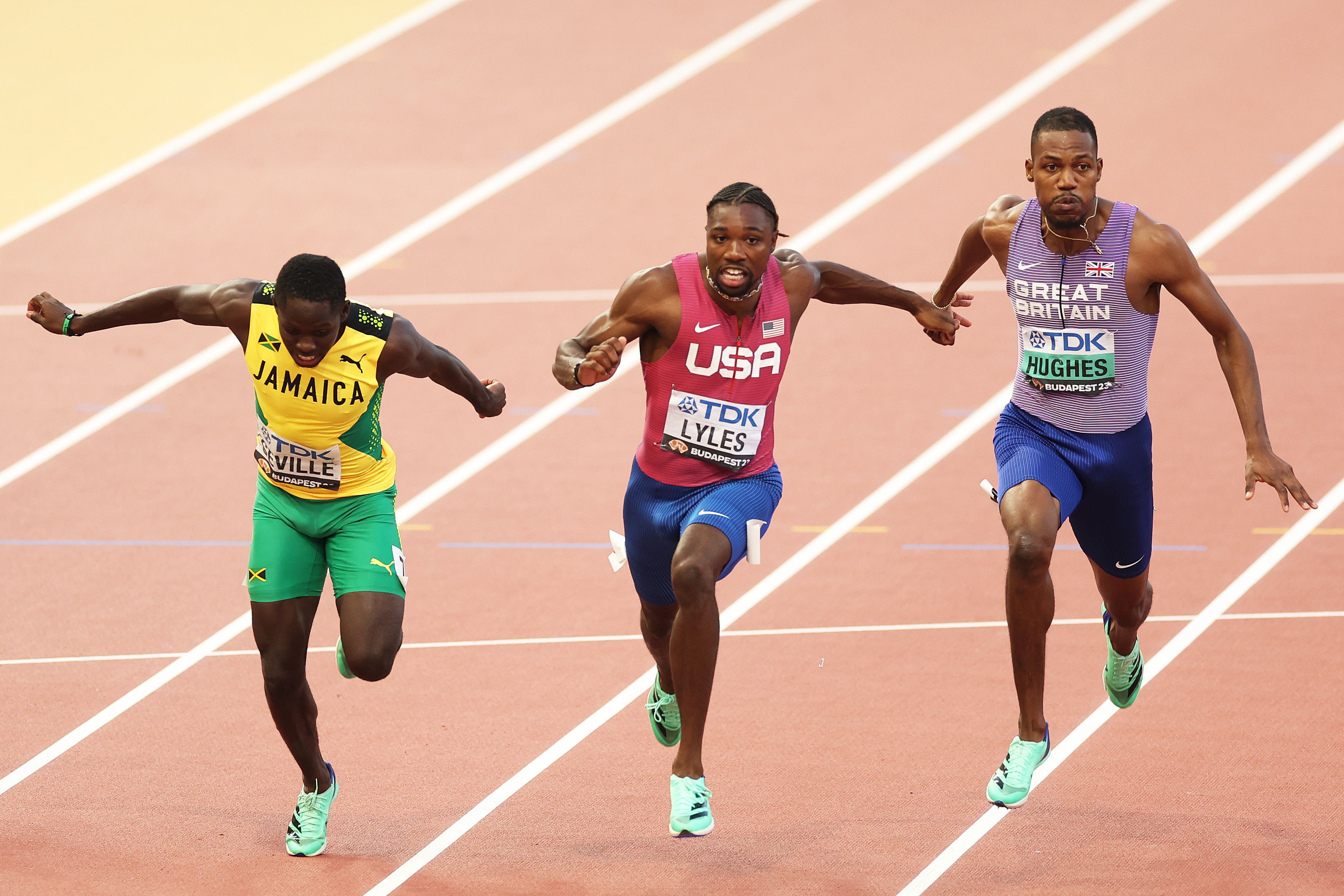 Oblique Seville, Noah Lyles and Zharnel Hughes at the 2023 World Championships in Budapest