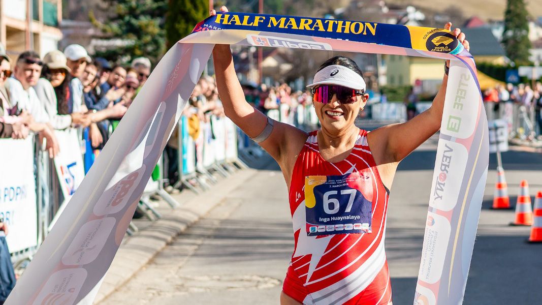 Evelyn Inga celebrates her win at the Dudinska 50