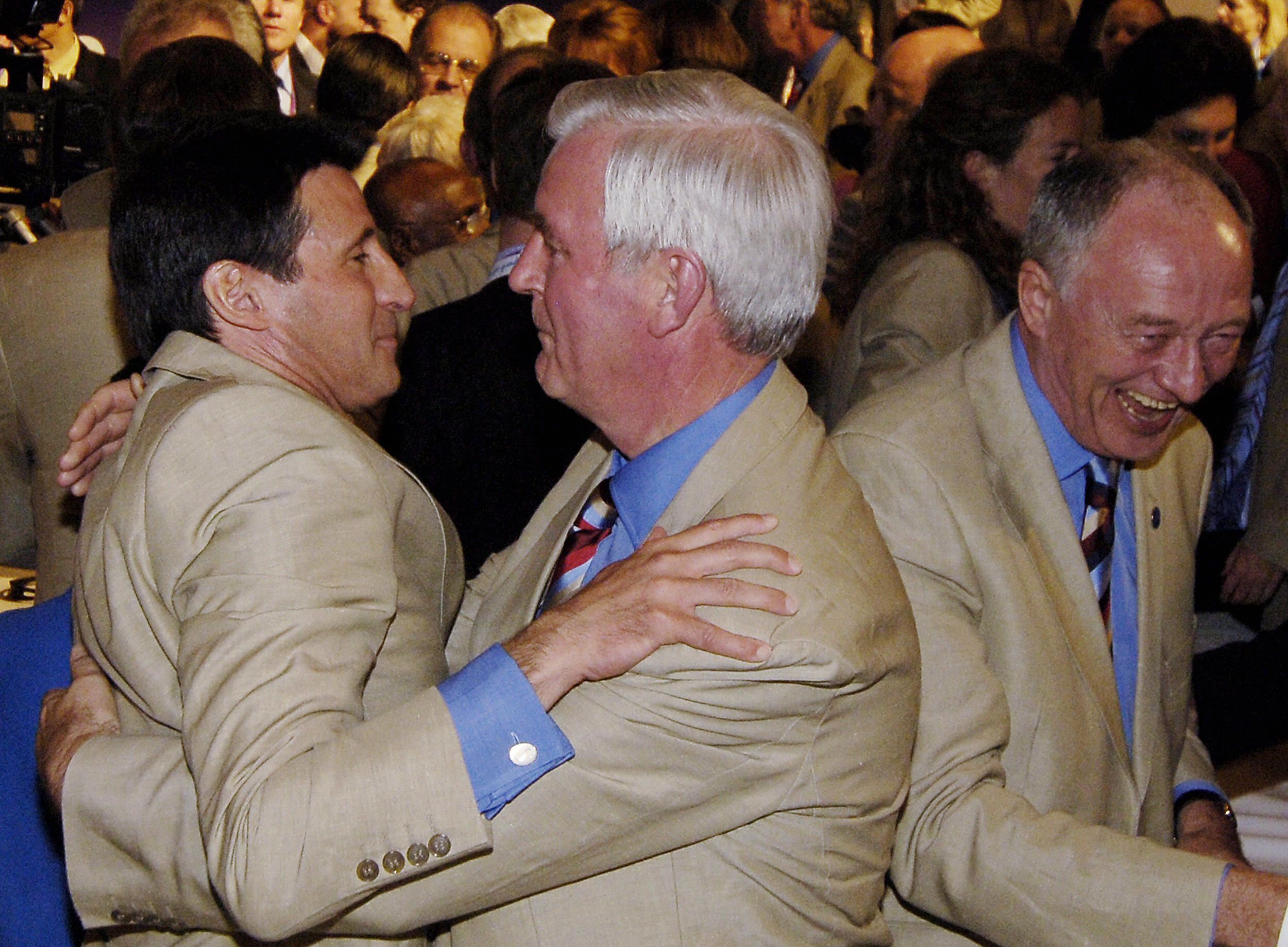 Sebastian Coe and Craig Reedie celebrate London being awarded the London 2012 Olympic Games