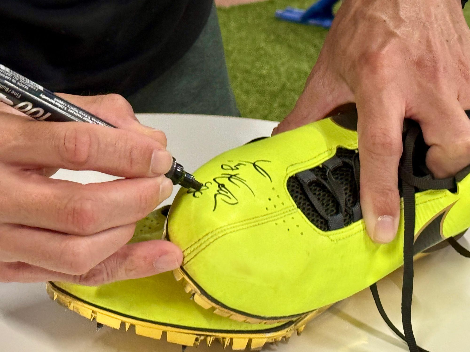 Trey Hardee signing his shoes