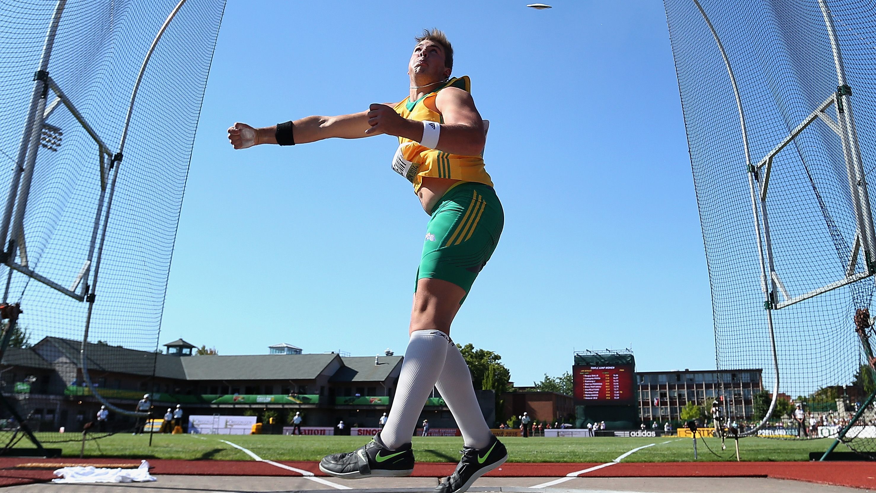 Matthew Denny in discus action in Eugene