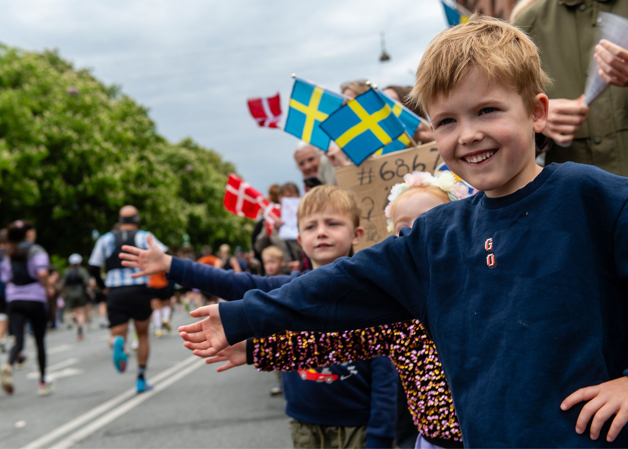 Spectators with Danish and Swedish flags