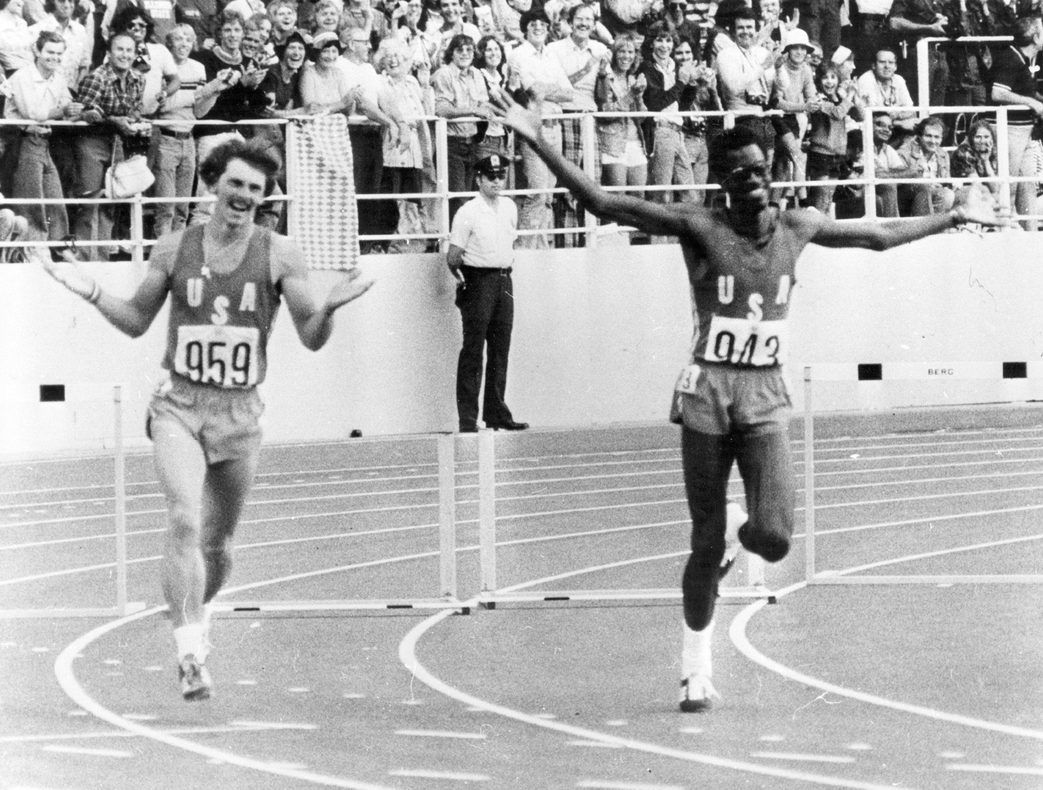 Edwin Moses (right) celebrates his 400m hurdles triumph at the 1976 Olympics