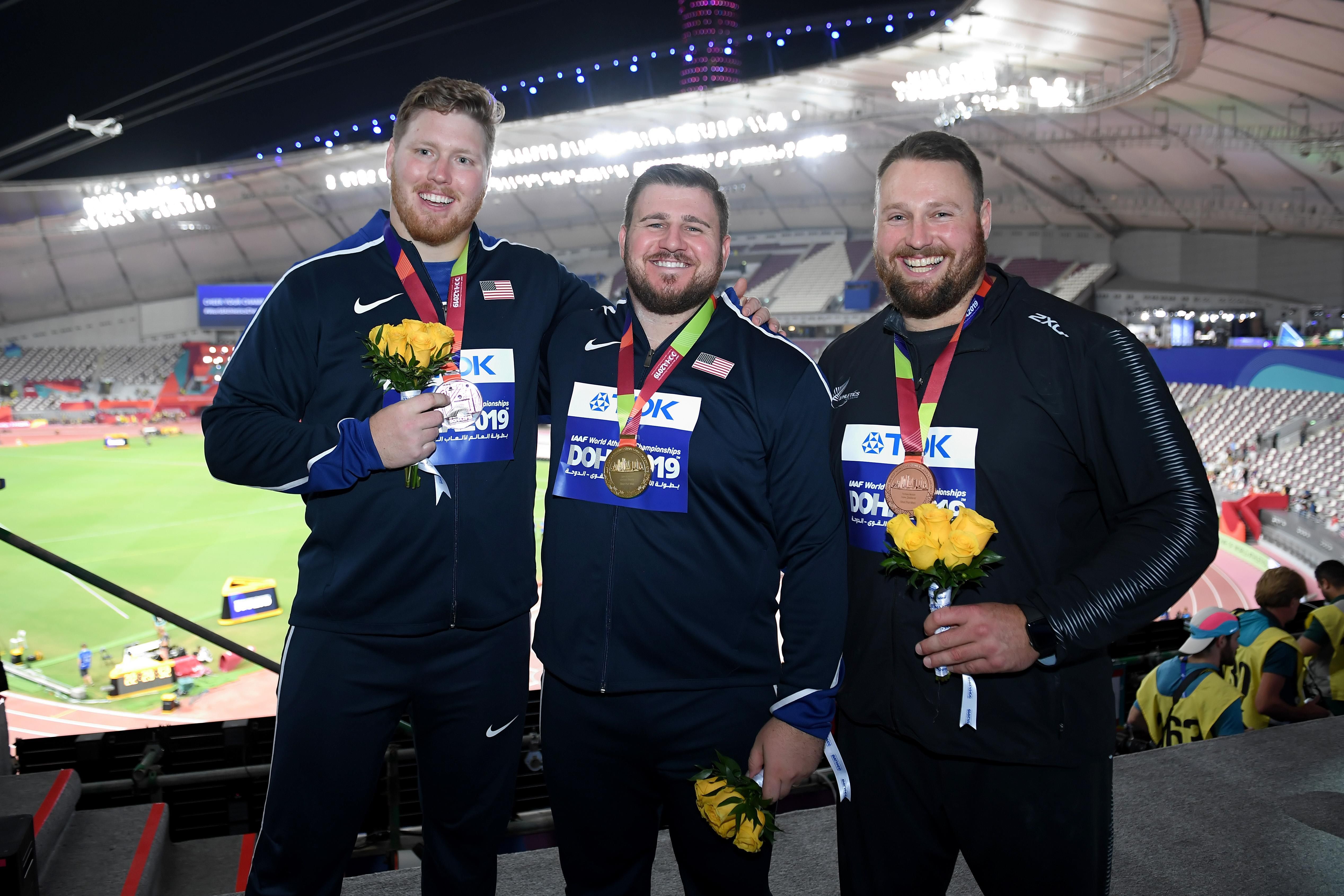 Men's shot put podium at the IAAF World Athletics Championships Doha 2019 - silver medallist Ryan Crouser, champion Joe Kovacs and bronze medallist Tom Walsh