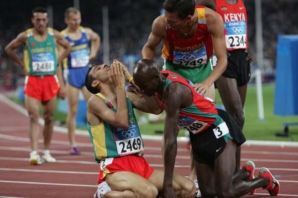 Hicham El Guerrouj and Bernard Lagat celebrate winning gold and silver in Athens