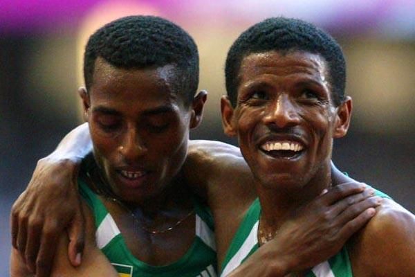 Team mates Kenenisa Bekele and Haile Gebrselassie after the final of the 10,000m