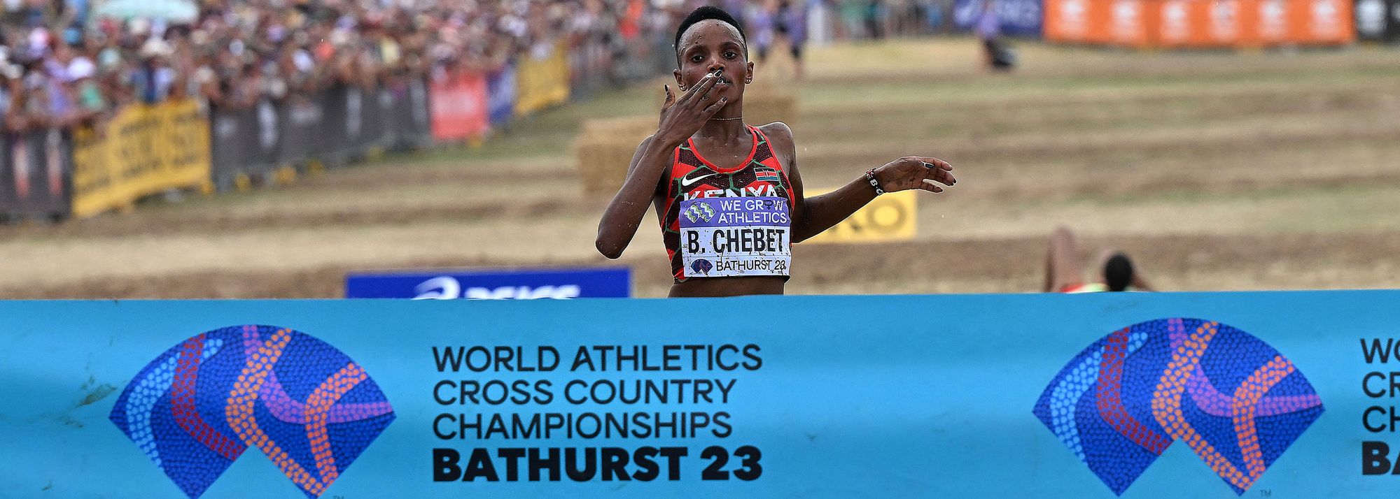 Kenya’s Beatrice Chebet passes pre-race favourite Letesenbet Gidey, who fell and was disqualified metres from the finish.