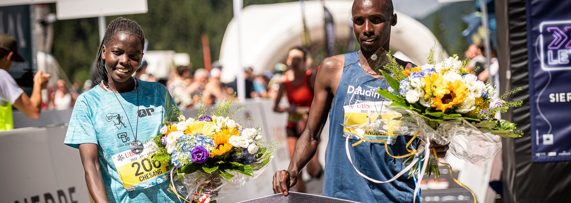 On a day of nail-biting racing in the Swiss Alps, it was Esther Chesang and Mark Kangogo who claimed victory