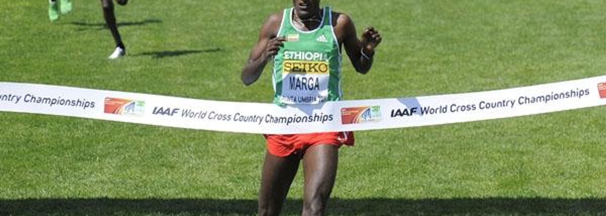 The IAAF World Cross Country Championships traditionally heralds the climax, and the end of the cross country season, but Ethiopia’s 2011 senior men’s champion Imana Merga cannot relax and hang up his spikes just yet.