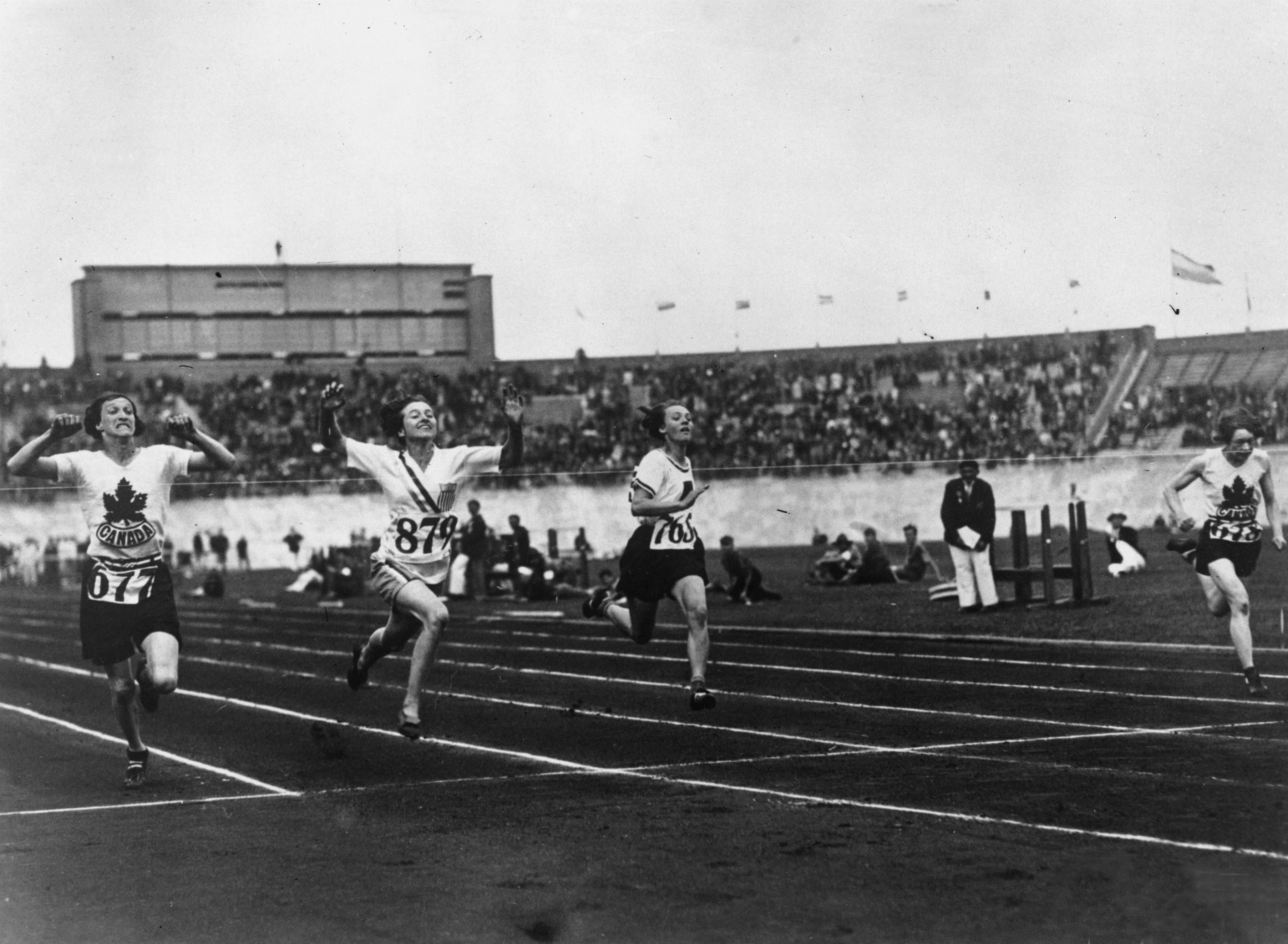 Elisabeth Schwartz (second left) wins the 1928 Olympic Games 100m