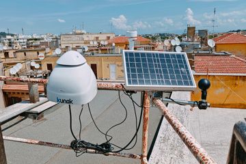 The device is solar-powered and is attached to a railing, pole, or lamp.