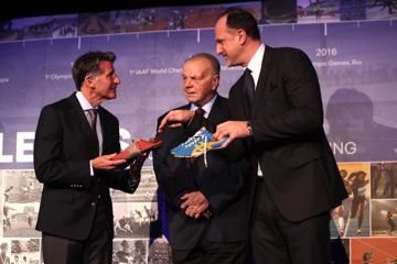 Father Janusz and son Andrzej Szewinski present Seb Coe with their wife and mother's spikes from 1960s and 1970s era. The latter are the spikes which Irena Szewinska wore when winning the 1976 Olympic Games 400m title